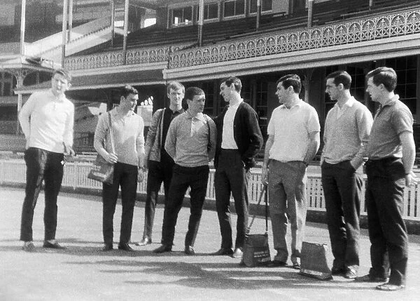 Everton football players inspecting the pitch at Sydney cricket ground during their tour