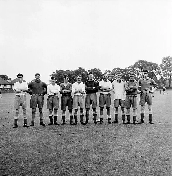Everton Football team training left to right: George Cummins; Ted Sagar; Jackie Grant