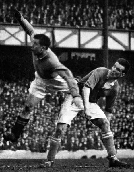 Everton footballer Dixie Dean in action for his team during a league match at Goodison