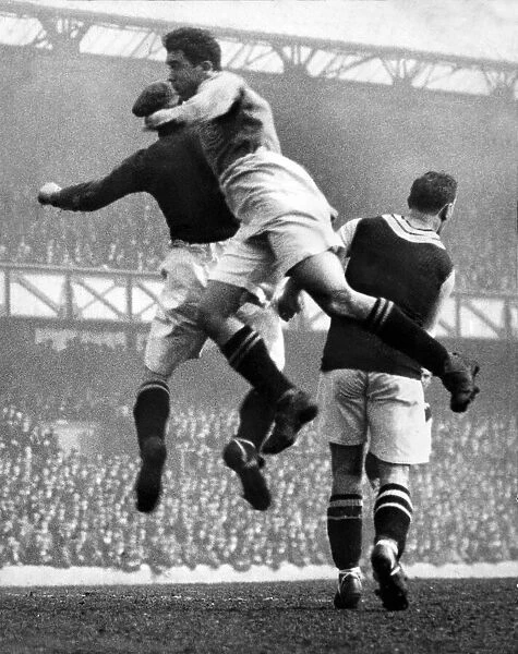 Everton footballer Dixie Dean in action for his team during a league match aginst Aston