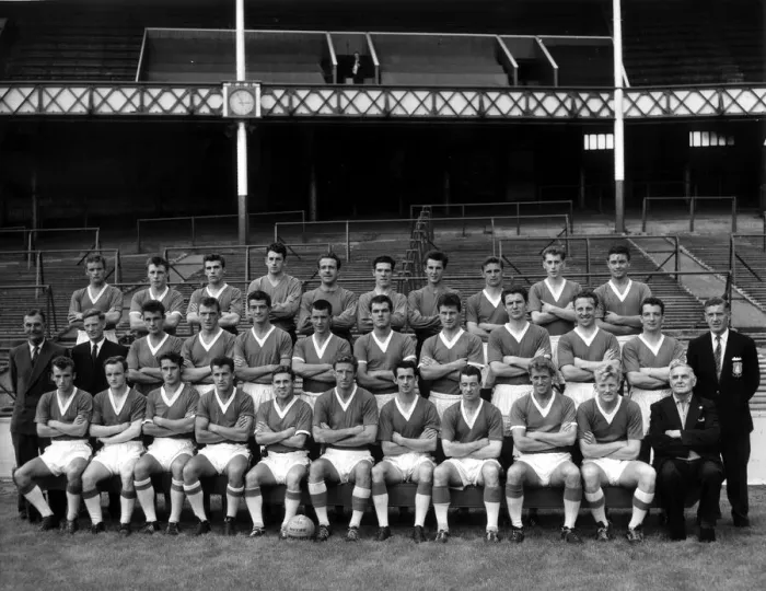 Framed Print : The Everton team pose with staff and trainers for a photograph on the pitch at Goodison Framed Print : The Everton team pose with staff and trainers for a photograph on the pitch at Goodison