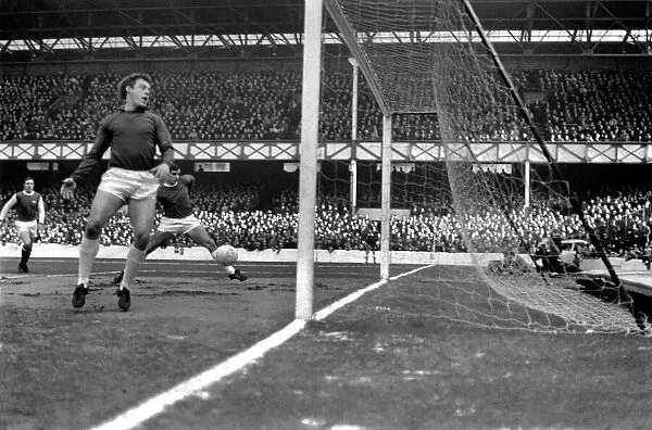 Everton v. Arsenal: West looks back in despair as Georgees shot goes past Hurstes foot to