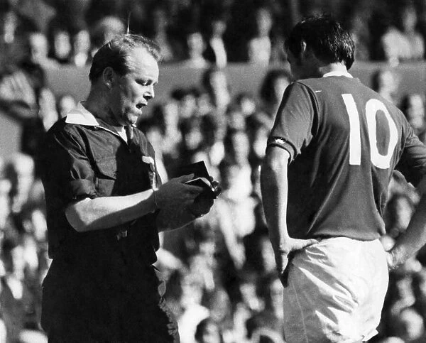 Everton v. Derby County. John Hurst booked by referee Jony Oliver. September 1971 P006197