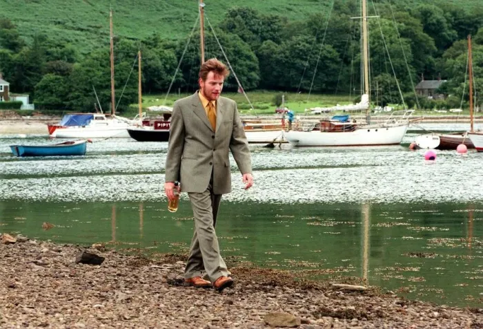 Framed Print : Ewan McGregor on th eIsle of Arran with bottle of Loch Ranza single malt whisky
