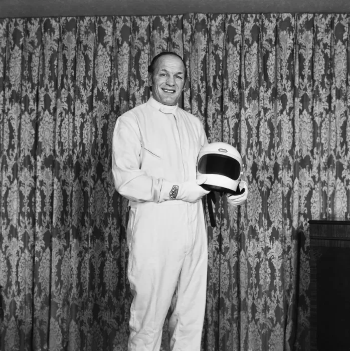 Framed Print : Ex Boxer Henry Cooper dressed in a Formula One out-fit. Formula One was one of his Framed Print : Ex Boxer Henry Cooper dressed in a Formula One out-fit. Formula One was one of his