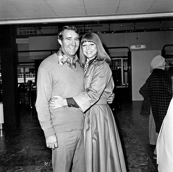 Ex Bunny Serena Williams with football manager Malcolm Allison