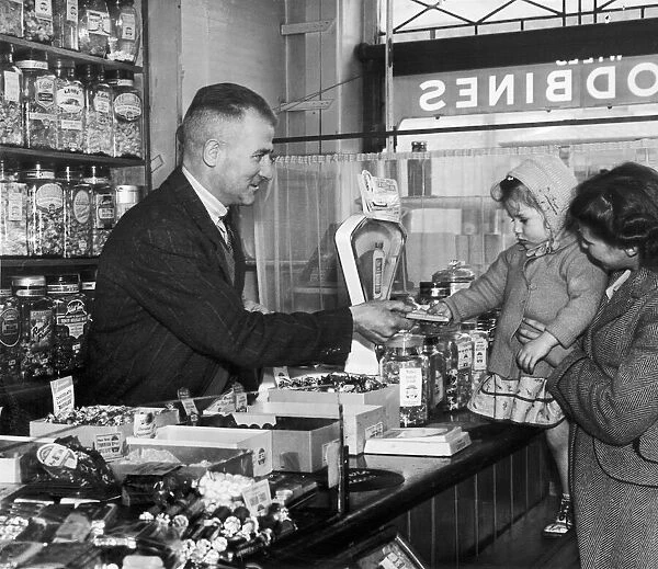 Ex-England cricketer Harold Larwood in his sweet shop in Blackpool 10th April 1949