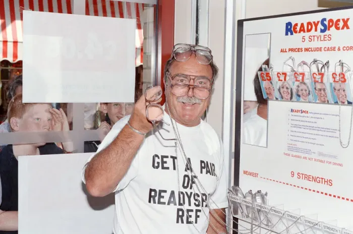 Framed Print : Ex footballer Jimmy Greaves at the worlds first spectacle vending machine Framed Print : Ex footballer Jimmy Greaves at the worlds first spectacle vending machine