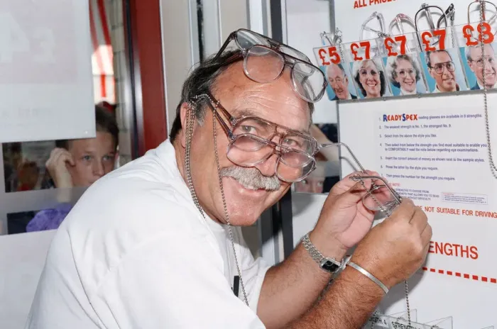 Framed Print : Ex footballer Jimmy Greaves at the worlds first spectacle vending machine Framed Print : Ex footballer Jimmy Greaves at the worlds first spectacle vending machine