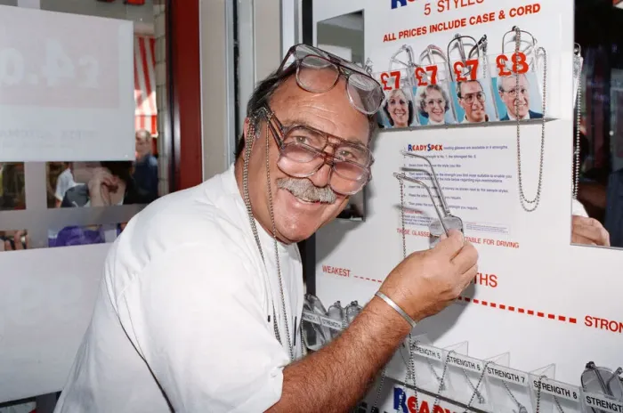 Framed Print : Ex footballer Jimmy Greaves at the worlds first spectacle vending machine Framed Print : Ex footballer Jimmy Greaves at the worlds first spectacle vending machine