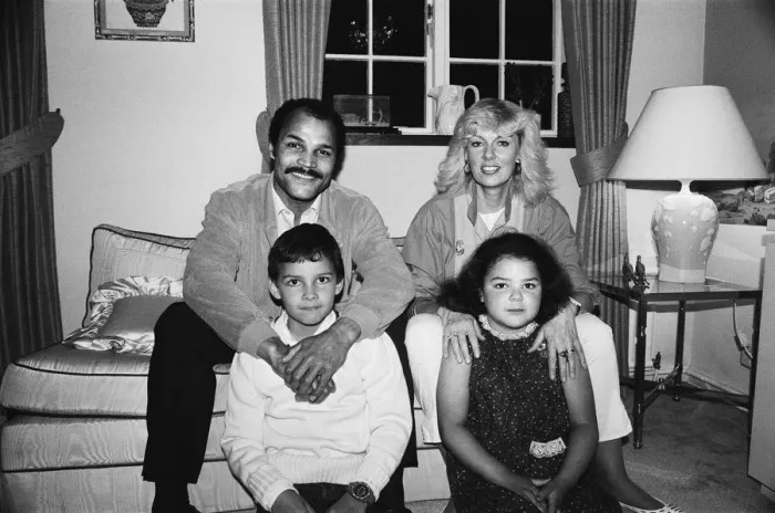 Framed Print : Ex-World Boxing Champion John Conteh at home with wife Veronica and two children Framed Print : Ex-World Boxing Champion John Conteh at home with wife Veronica and two children