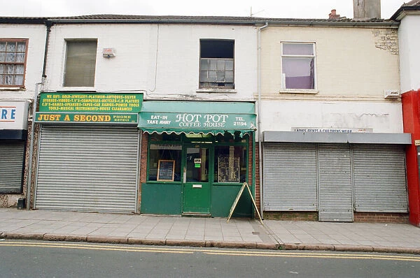 Examples of shuttered and non-shuttered shops on Far Gosford Street