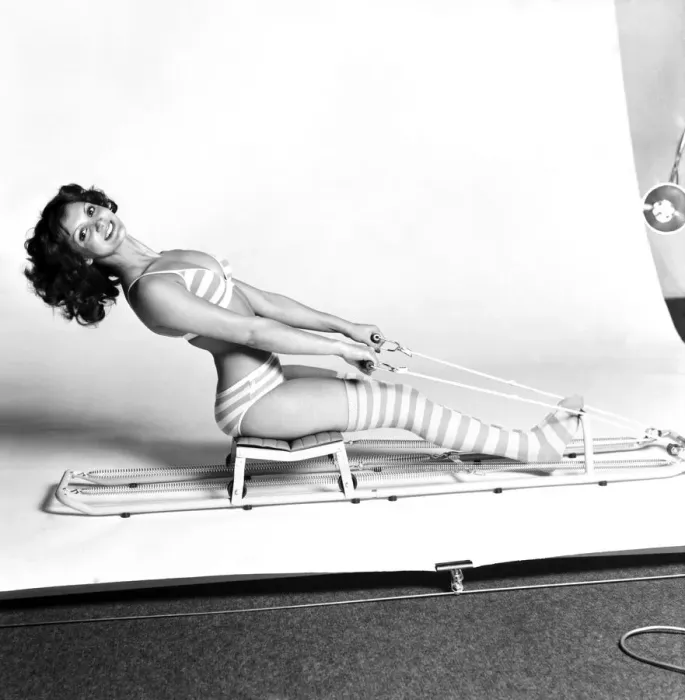 Framed Print : Exercise machine model Stephanie Marrian having a good workout Framed Print : Exercise machine model Stephanie Marrian having a good workout