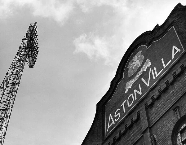 Exterior view of the entrance to Villa Park football stadium, and floodlights
