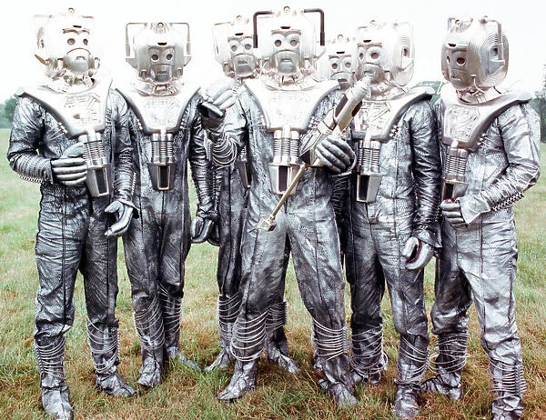 Extras dressed as Cybermen seen here on location near Arundel during the filming of