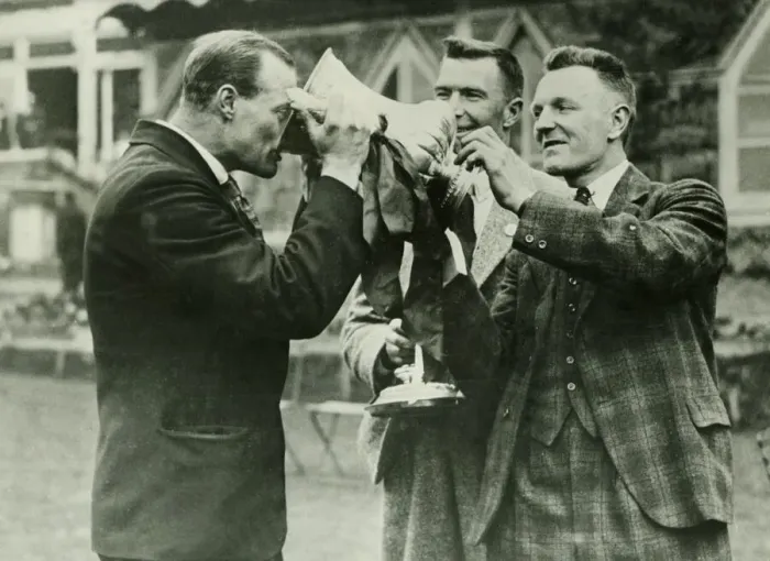 Framed Print : FA Cup Final 1929 Bolton v Portsmouth Seddon takes a cheerful draught watched by Framed Print : FA Cup Final 1929 Bolton v Portsmouth Seddon takes a cheerful draught watched by