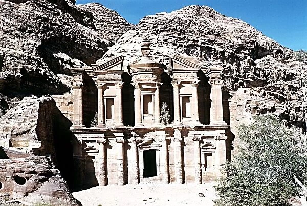 Facade of the Deir or Monastery temple in the ruins of Petra Southern Jordan Palestine