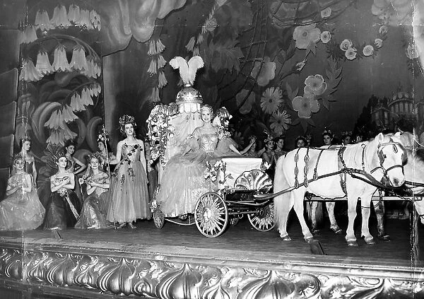 The fairytale coach drawn by white ponies moves across the stage at Newcastle