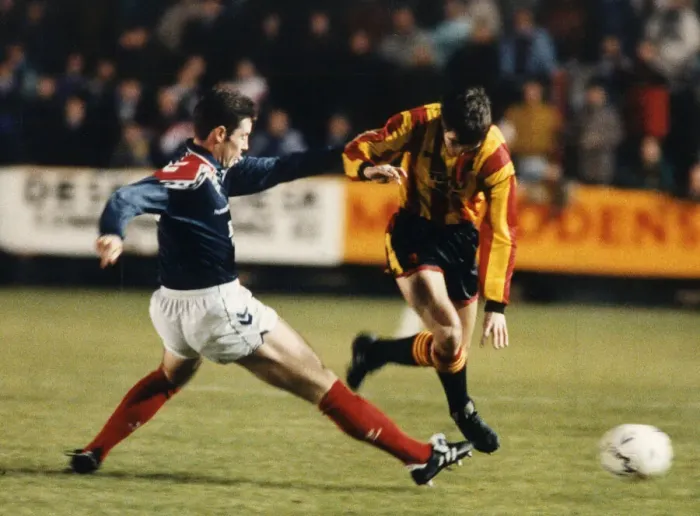 Framed Print : Falkirk footballer David Weir moving in to cut out the threat of Gerry Britton during