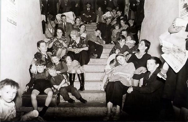 Families take cover from the Luftwaffe bombing of London in this disused London