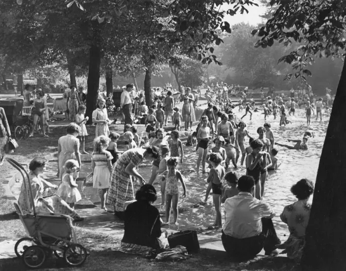 Framed Print : Families enjoying the summer weather in Brandling Park in Newcastle - paddling in Framed Print : Families enjoying the summer weather in Brandling Park in Newcastle - paddling in