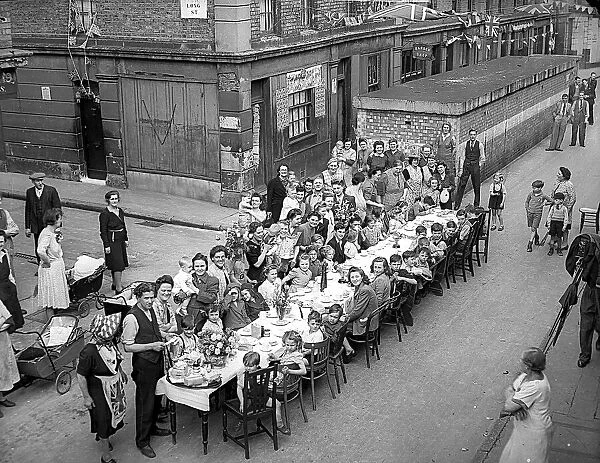 Families have fun at a street party to celebrate VE day to mark the end of WW2 in Europe