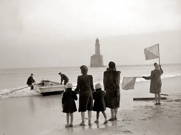 Framed Print : The families of the Rattray Head lighthouse keepers semaphore their loved ones as Old Framed Print : The families of the Rattray Head lighthouse keepers semaphore their loved ones as Old
