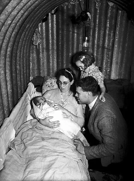Family in Air raid shelter during WW2