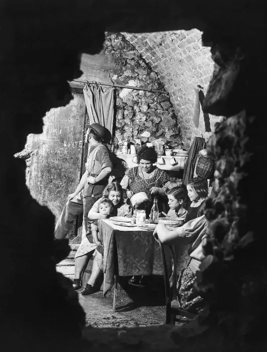 Framed Print : A family eating dinner in the bombed out remains of their cellar. October 1940 Framed Print : A family eating dinner in the bombed out remains of their cellar. October 1940