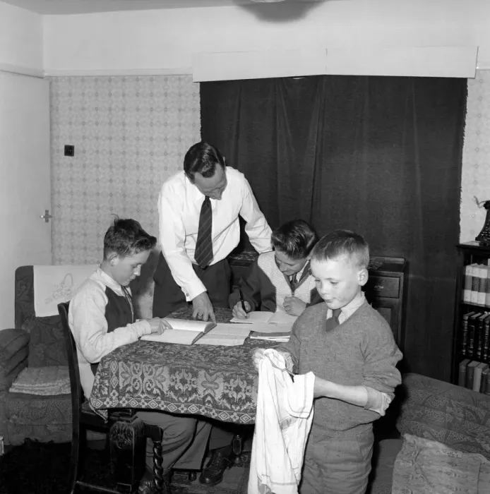 Framed Print : Family Life: Mr. John Theakeston seen here helping his two sons with their school Framed Print : Family Life: Mr. John Theakeston seen here helping his two sons with their school