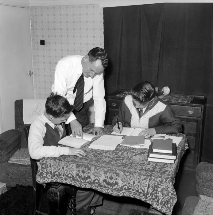 Framed Print : Family Life: Mr. John Theakeston seen here helping his two sons with their school Framed Print : Family Life: Mr. John Theakeston seen here helping his two sons with their school