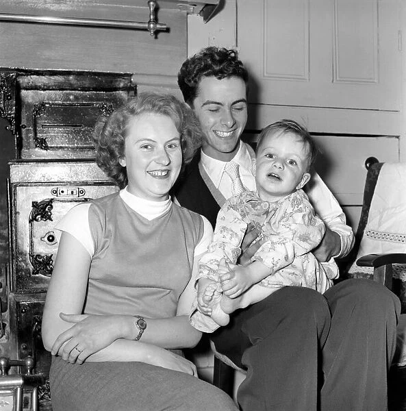 Family life: Mr. and Mrs. Hull with their son. 1954 A160-007