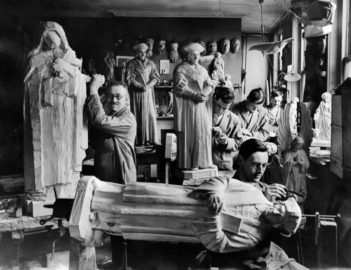 Framed Print : Family of wood carvers seen here with carvings of saints and angels