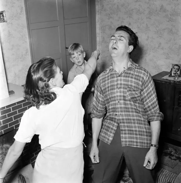 Framed Print : Familys: Voilence. Stuntman Steve Donohue seen here having a Mock Fight with his daughter Framed Print : Familys: Voilence. Stuntman Steve Donohue seen here having a Mock Fight with his daughter