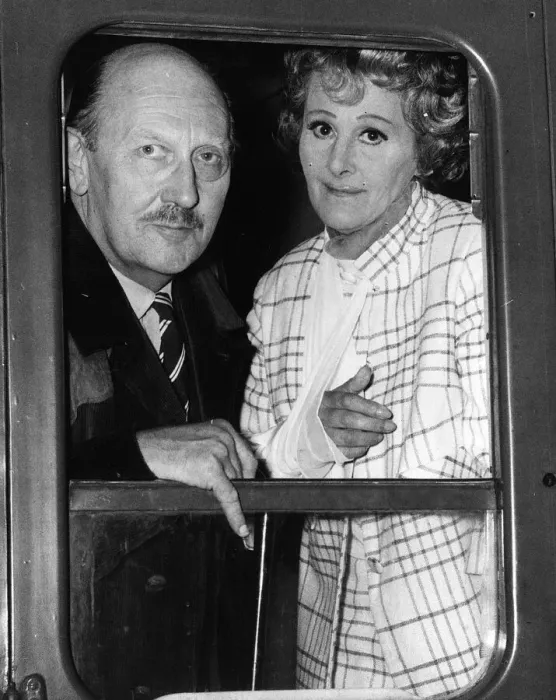 Framed Print : Fanny Cradock gourmet chef with husband John Cradock on train 1967