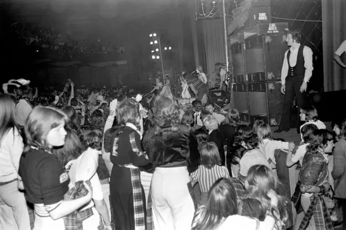Framed Print : Fans cheer as the Bay City Rollers perform on stage at Cardiff. May 1975 Framed Print : Fans cheer as the Bay City Rollers perform on stage at Cardiff. May 1975