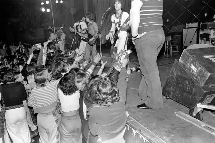 Framed Print : Fans cheer as the Bay City Rollers perform on stage at Cardiff. May 1975 Framed Print : Fans cheer as the Bay City Rollers perform on stage at Cardiff. May 1975