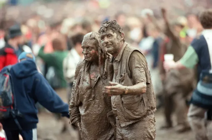 Framed Print : Fans covered in mud, at Margam Park to watch Catatonia performing, South Wales Framed Print : Fans covered in mud, at Margam Park to watch Catatonia performing, South Wales
