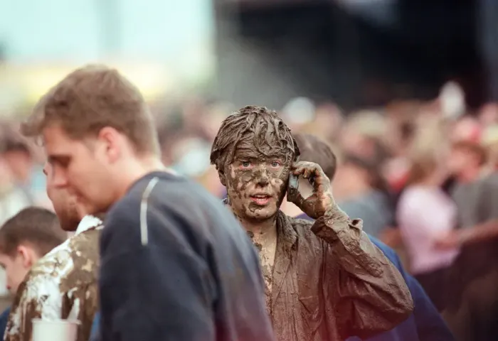 Framed Print : Fans covered in mud, at Margam Park to watch Catatonia performing, South Wales Framed Print : Fans covered in mud, at Margam Park to watch Catatonia performing, South Wales