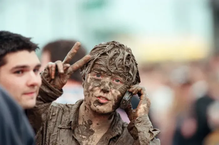 Framed Print : Fans covered in mud, at Margam Park to watch Catatonia performing, South Wales Framed Print : Fans covered in mud, at Margam Park to watch Catatonia performing, South Wales
