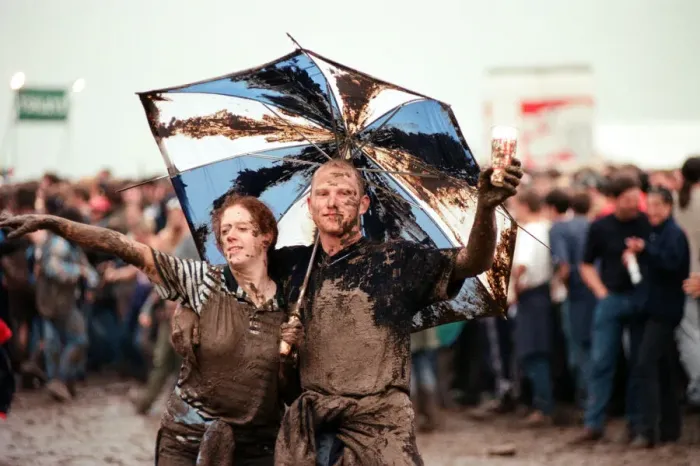 Framed Print : Fans covered in mud, at Margam Park to watch Catatonia performing, South Wales Framed Print : Fans covered in mud, at Margam Park to watch Catatonia performing, South Wales