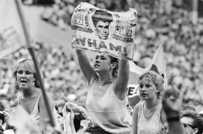 Framed Print : Fans enjoy Wham ! The Farewell Concert at Wembley Stadium, London on 28th June 1986 Framed Print : Fans enjoy Wham ! The Farewell Concert at Wembley Stadium, London on 28th June 1986