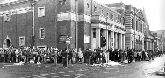 Framed Print : Fans of Genesis queueing up outside Newcastle City Hall for tickets