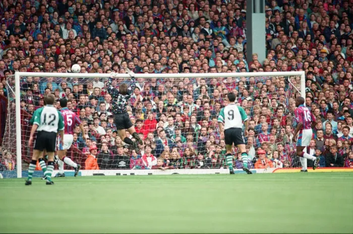 Framed Print : Fans in the Holte End stand in the final game before it was demolished Framed Print : Fans in the Holte End stand in the final game before it was demolished