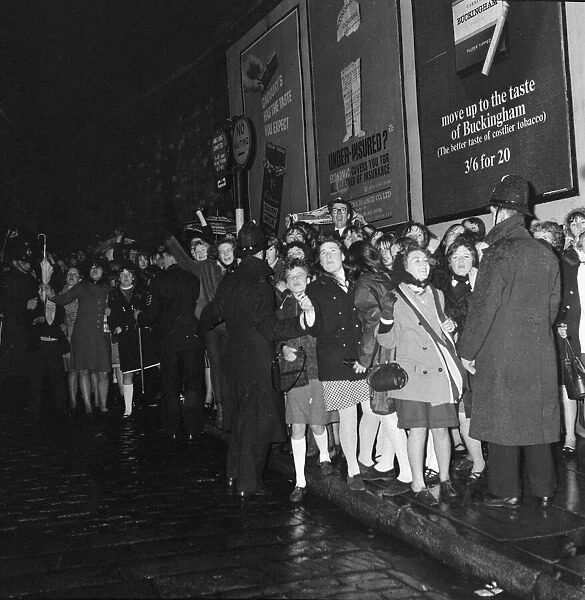 Fans meet The Beatles in Liverpool, queuing up outside for the show