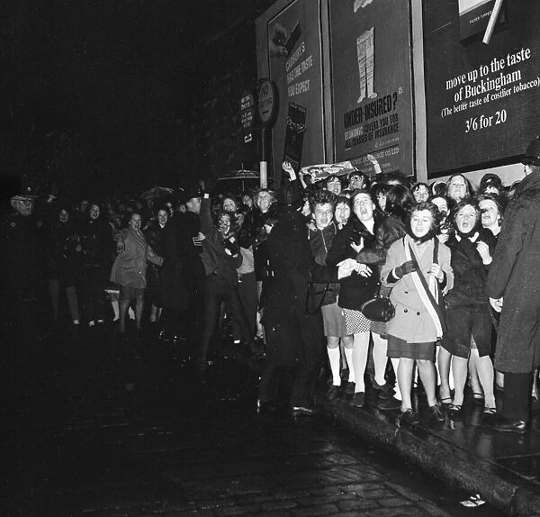 Fans meet The Beatles in Liverpool, queuing up outside for the show