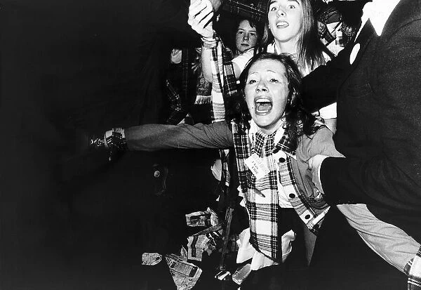 Fans of the pop group Bay City Rollers screaming Circa 1975