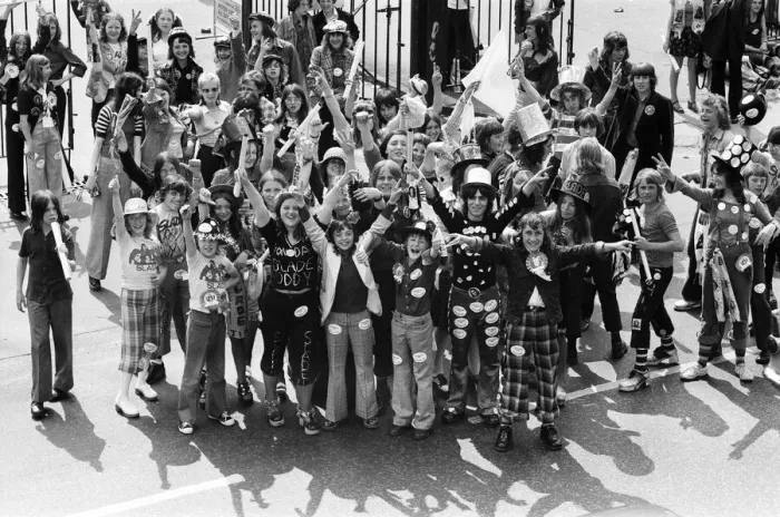 Framed Print : Fans of pop group Slade get ready for the invasion of Earls Court tonight where the group