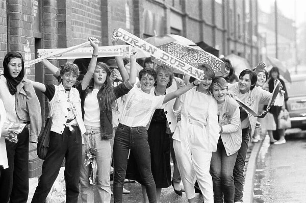 Fans queue outside football ground ahead of Duran Duran Concert at Villa Park, Birmingham