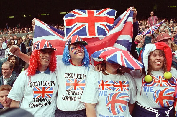 Fans of Tim Henman support the English tennis player during his Fourth Round Match of